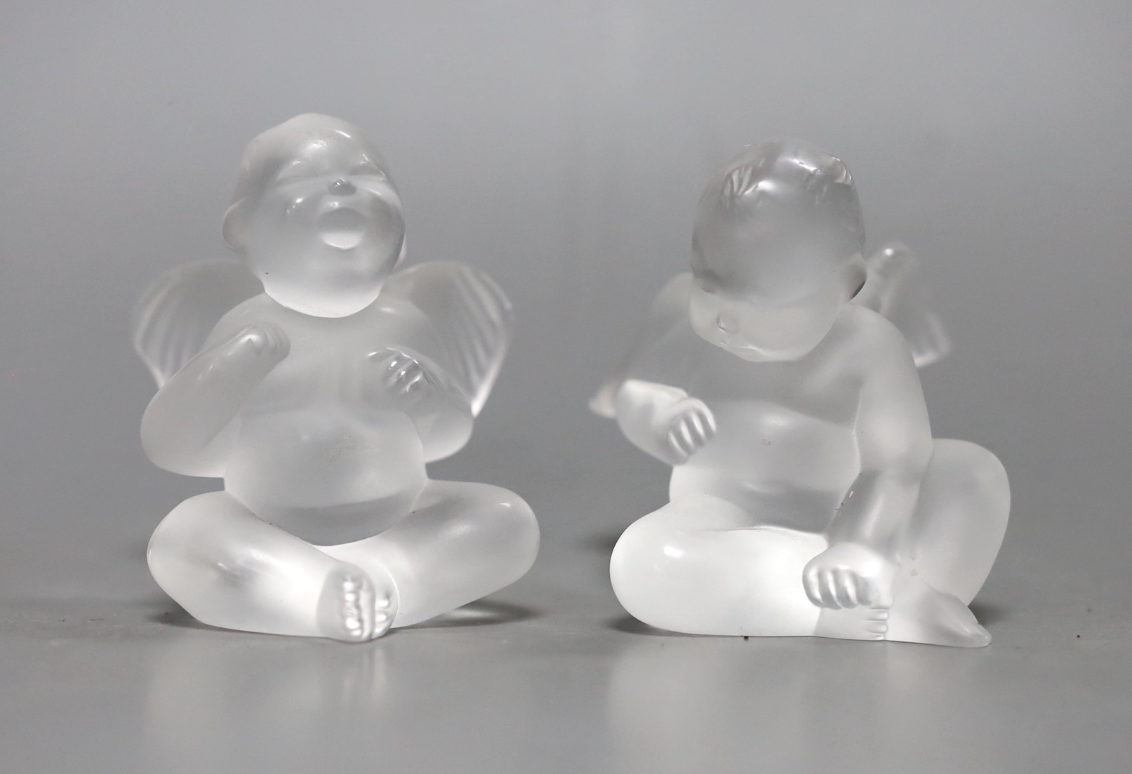 Two boxed Lalique glass cherub models, 7.5cm